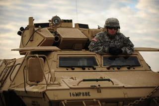 Illustration for article titled The M1117 Guardian: When A Hummer Makes Love To A Tank